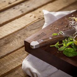 John Boos 1887 Rustic Edge Walnut Cutting Board 13"x12" 4 John Boos 1887 Rustic Edge Walnut Cutting Board 13"x12" -All-Clad Shop john boos 1887 rustic edge walnut cutting board 13x12 lifestyle